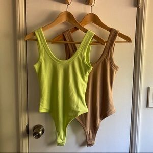 2 Uniqlo x Alexander Wang body suits yellow & nude